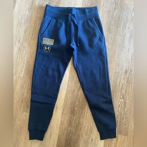 NWOT Under Armour Project Rock women’s Navy & Gold fleece sweatpants